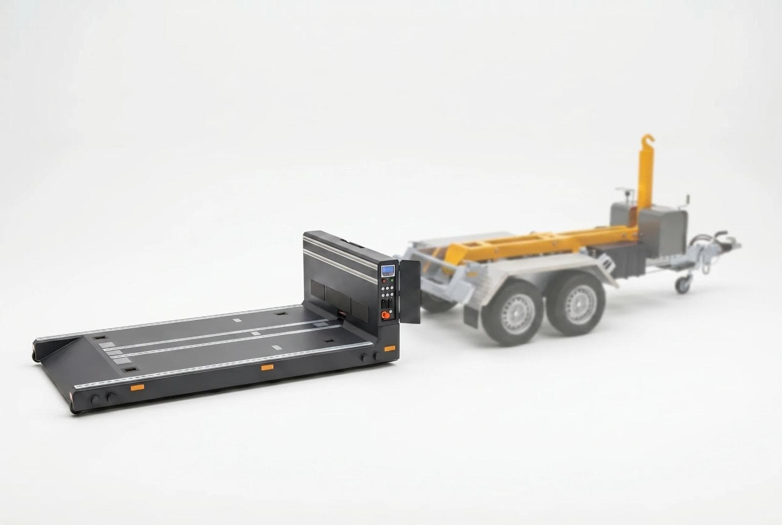 The detachable Akkuboard battery platform with an open cargo deck, separated from the trailer.